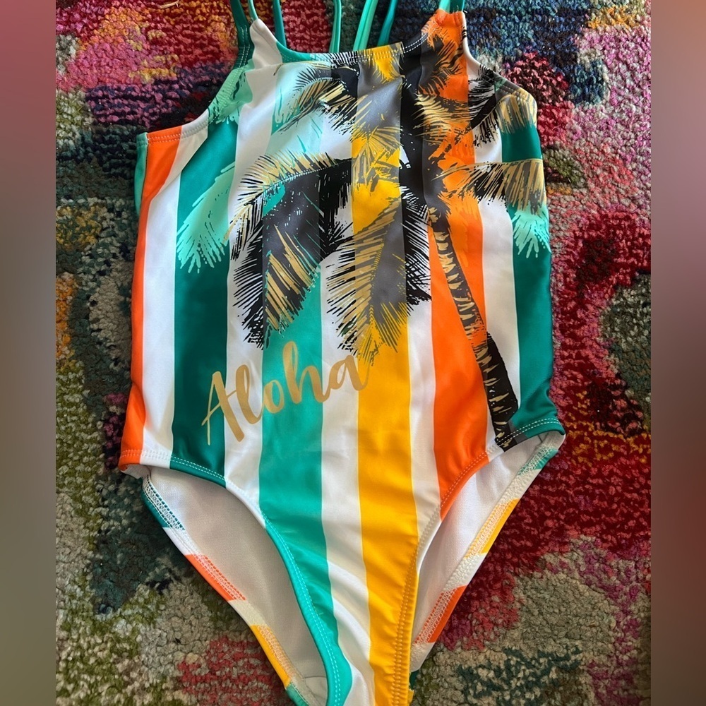 One piece girl bathing suit.